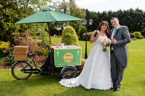 Bride and Groom pose in front of Ice cream truck at the Batch Country Lodge somerset