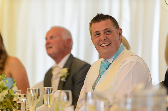 Groom smiles at the Batch Country Batch country house