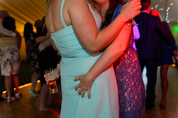 A guest dancing grabs a bridesmaids bum at the Batch Country house somerset