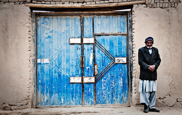 Man and the blue door