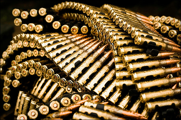 A pile of 7.62 link shining in the rain.